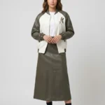 Bomber jacket with hand-embroidered letter R and bird motif applique attached, with pockets and zipper closure