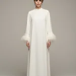 Dress with feather work on sleeve