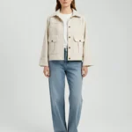 Matte leather medium length jacket with flap pockets and leather piping, palm leaf zari work