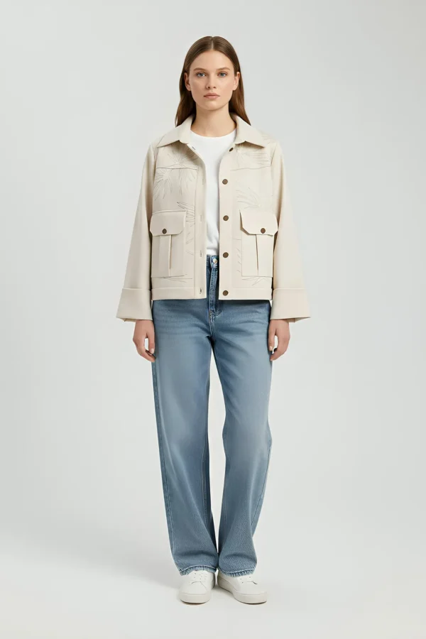 Matte leather medium length jacket with flap pockets and leather piping, palm leaf zari work