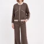 Brown Bomber jacket and wide cut trouser